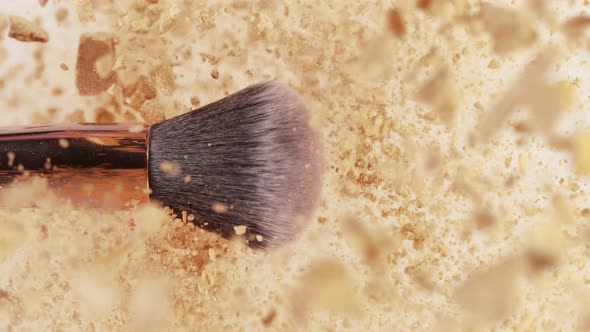 Super Slow Motion Shot of Makeup Brush and Brown Powder Explosion at 1000 Fps alt