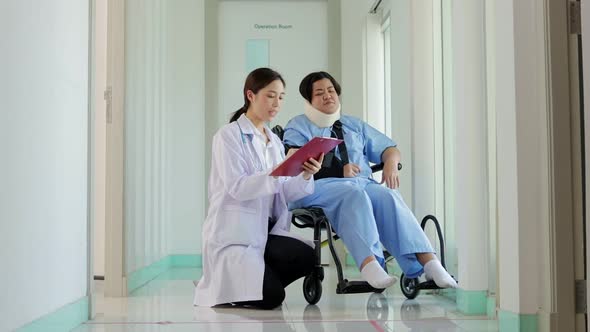 Female doctor taking notes on treatment of obese female patients alt