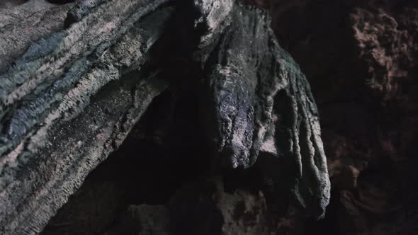 Underground Cave with Stalactite Rock Formations Hanging From Kuza Cave Ceiling alt