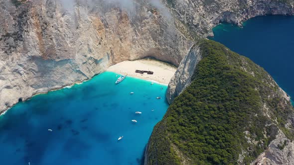 View of Navagio beach, Zakynthos Island, Greece. Blue sea water. Rocks and sea. alt