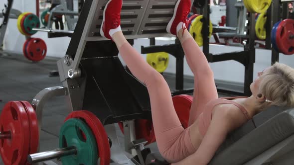 Young woman training in a sports club