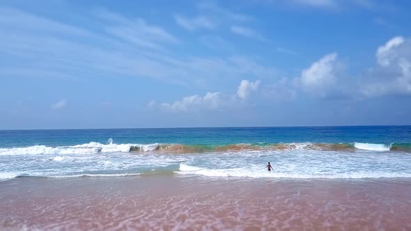 Asian Woman Feet Walking Barefoot Beach at Endless Ocean Seaside Leaving Footprints in Sand alt