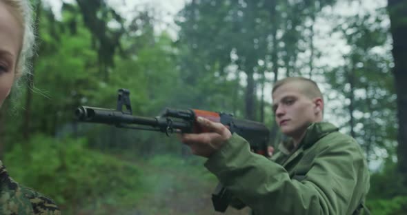 Terrorist with Weapon Captured Woman Soldier and Hostage Concept alt