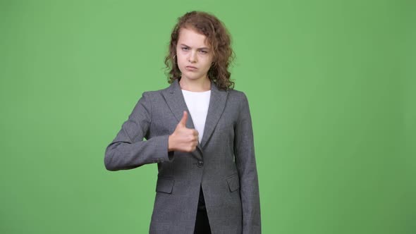 Young Beautiful Businesswoman Giving Thumbs Up alt