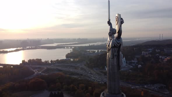 the national flag of Ukraine and the statue of liberty over Kyiv, panorama 360