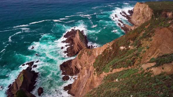 View from Top of Huge Cliff with Breaking Ocean Waves in Big Sur, Cali alt