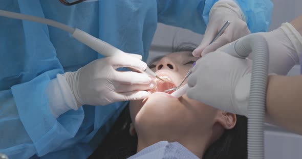 Woman having dental checkup alt