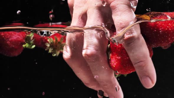 Washing Strawberries in Water Slow Motion