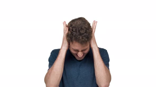 Portrait of Irritated Guy in Tshirt Gesturing and Shouting in Anger and Stress Isolated Over White alt