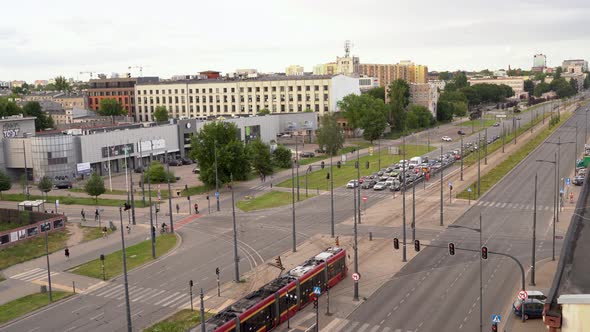 Wide angle aerial view of cityscape with mix of modern and medieval architecture, Lodz alt