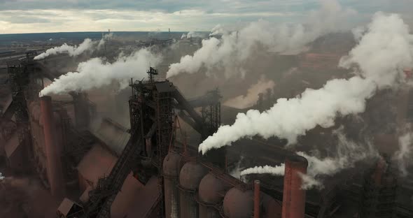 Aerial View. Emission To Atmosphere From Industrial Pipes. alt