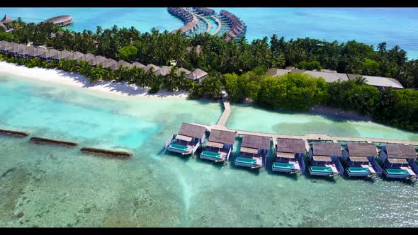 Aerial drone travel of beautiful seashore beach trip by transparent sea and white sandy background o alt