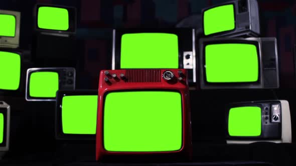 Stack of Old TV turning on Green Screens. Iron Tone., Stock Footage