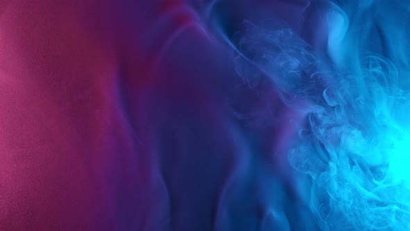 Slow Motion Shot of Modern Neon Smoke Abstract Background. alt