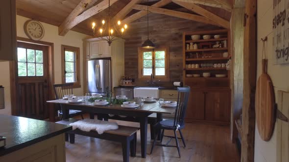 real estate gorgeous kitchen in log cabin winter styled 4k alt