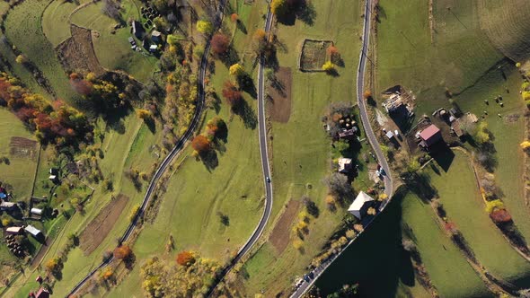 Aerial View of Autumn Rural Landscape With Colorful Forest and Countryside Homestead alt