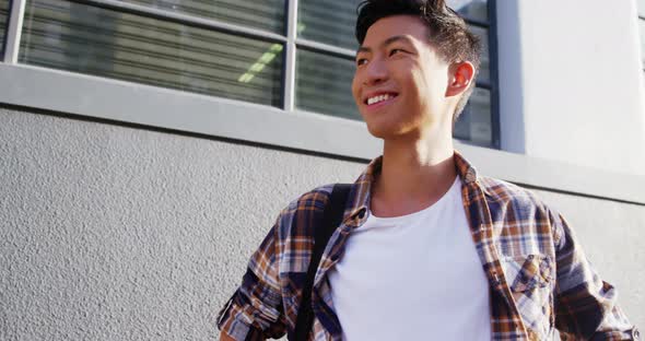 Man standing and smiling alt