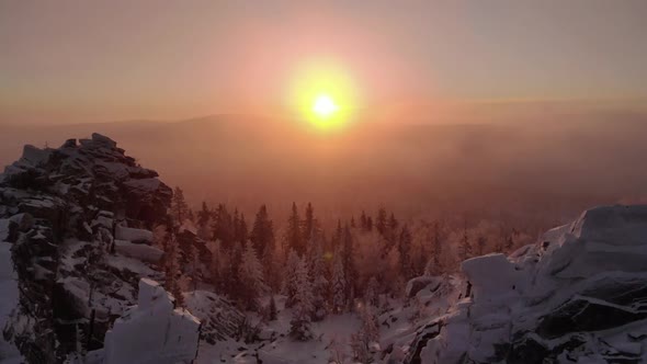 Wonderful Sunset in the Snowy Mountains on a Frosty Winter Evening