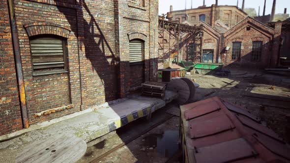 Old Abandoned Industrial Buildings at Factory alt