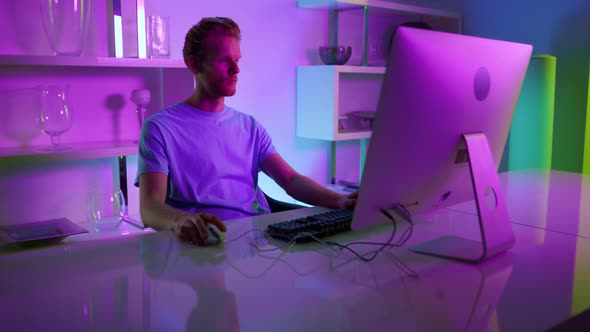 Focused Gamer Playing Video Game alt