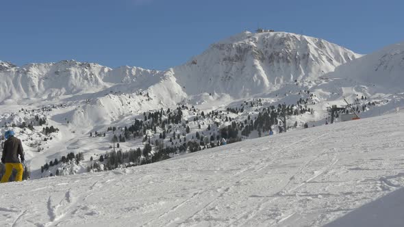 People skiing at La Plagne  alt