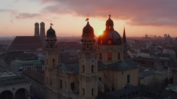 Circling a Stunning Pretty Cathedral in German City Munich with 2 Towers in Beautiful Sunset Light alt
