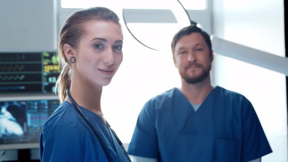 Professional medical doctors working in emergency medicine. Portrait of surgeon and the nurse. alt