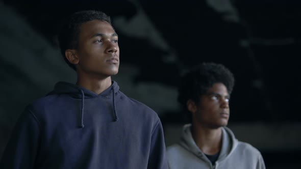 Desperate Male Teenagers Looking Depressed, Dreaming of New Life, Poverty Crisis alt