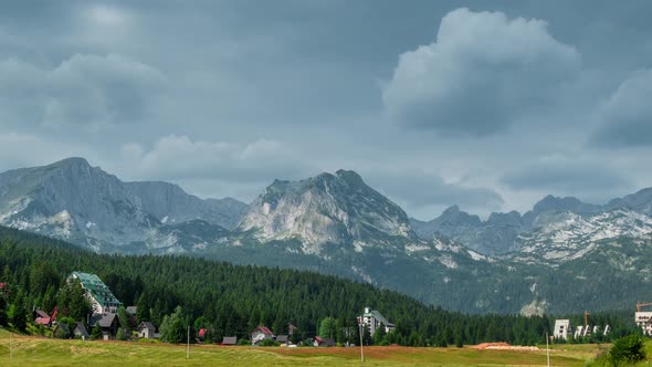 Local Houses in Zabljak Zabljak and Mountains with Clouds Montenegro alt