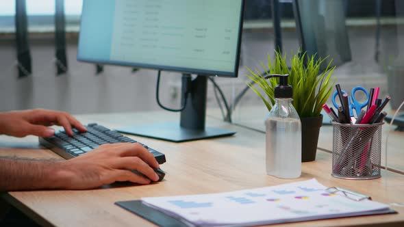 Man Using Hand Sanitizer Alcohol Gel alt