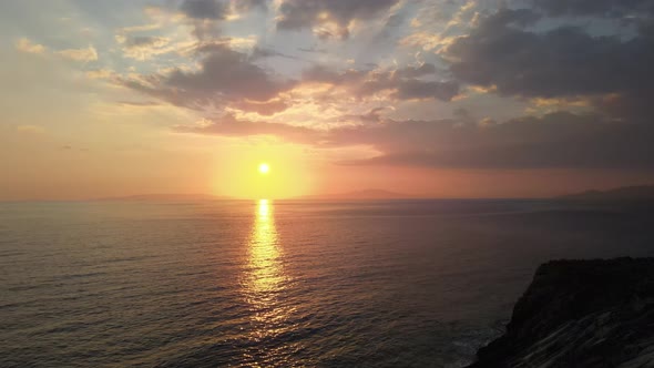 Golden sunset aerial over the sea