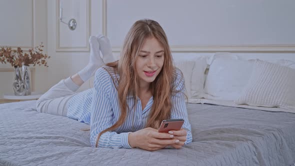 Caucasian Female Messaging Using Mobile