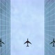 Airplane flying over glass skyscrapers - VideoHive Item for Sale