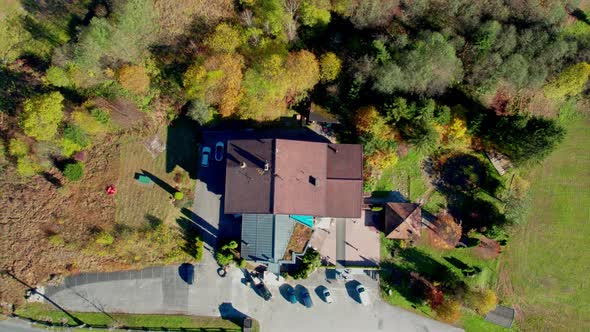 Drone Rising From Hotel By Klammsee Reservoir In Autumn alt