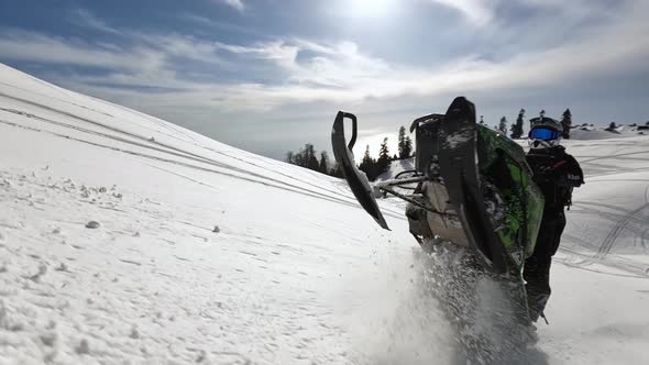 Aerial Fpv View Professional Mountain Biker Snowmobile Performing Trick Stuntrading alt