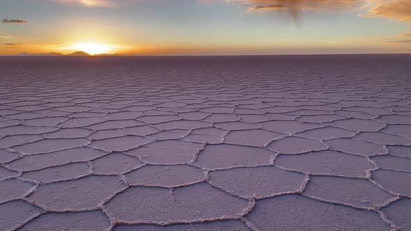 View of Hexagonal Formations on the Surface of Salar de Uyuni in Sunset, Bolivia