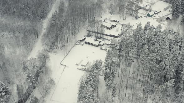 Winter Landscape of a Russian Village in the Forest