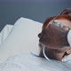 Putting Oxygen Mask on Patient - VideoHive Item for Sale