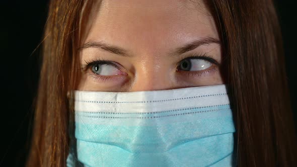 Close Up of Nurse's Eyes in a Mask for Virus Protection. A Doctor During Pandemic.