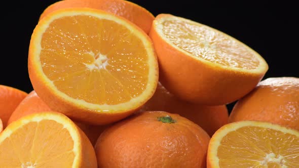 Mountain of Fresh Oranges Cut Gyrating alt