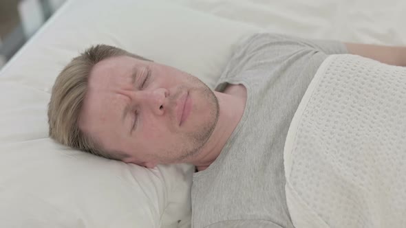 Man Waking Up From Nightmare alt