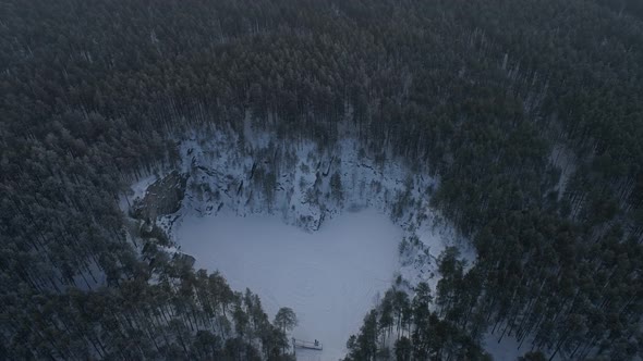 Flooded heart-like talc quarry "Talc stone" in forest near the Sysert city 07 alt
