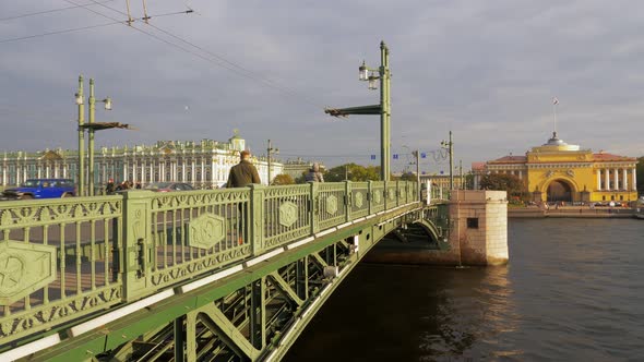 City Dwellers and Transport Are Moving on Palace Bridge in Saint Petersburg