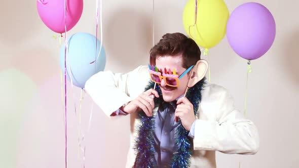 Moustache man dancing funny in photo booth alt