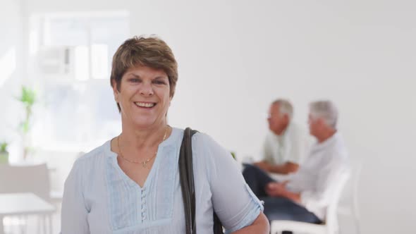 happy Caucasian senior woman spending time before her ballroom dancing class alt