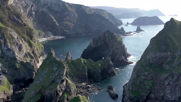 Flying Above the Cobblers Tower at Glenlough Bay Between Port and Ardara in County Donegal is alt