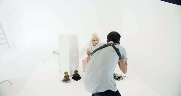 Woman Posing for Photoshoot in Studio