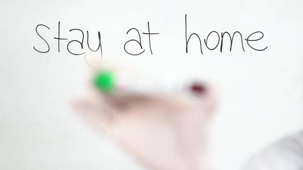 A young woman doctor holds positive coronavirus test. Close up shot.	