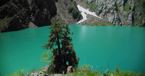 Mountain Lake of green and blue color Urungach. Located in Uzbekistan, Central Asia. 8 out of 20 alt