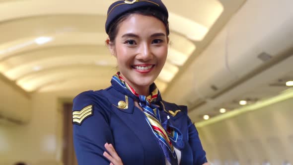 Cabin Crew or Air Hostess Working in Airplane alt
